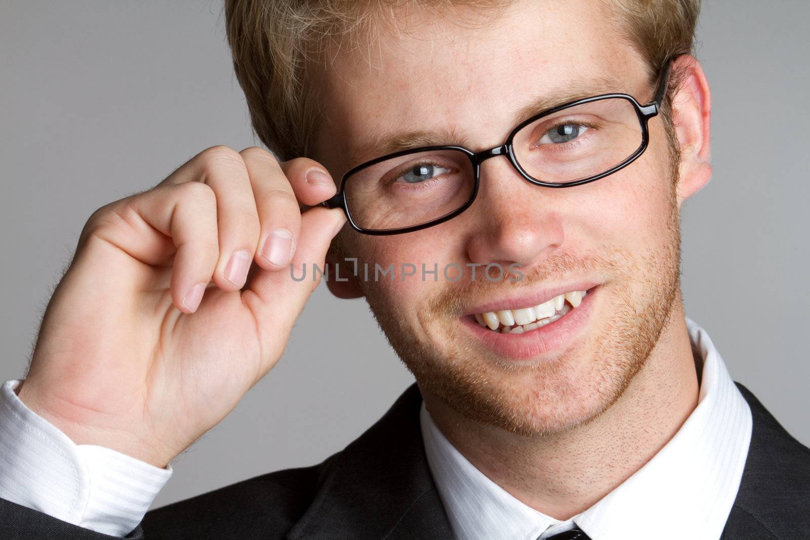 Smiling businessman wearing glasses