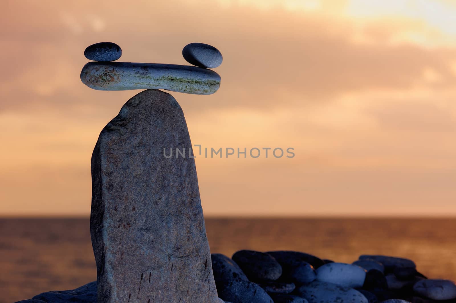 Model of Scales against the evening sky