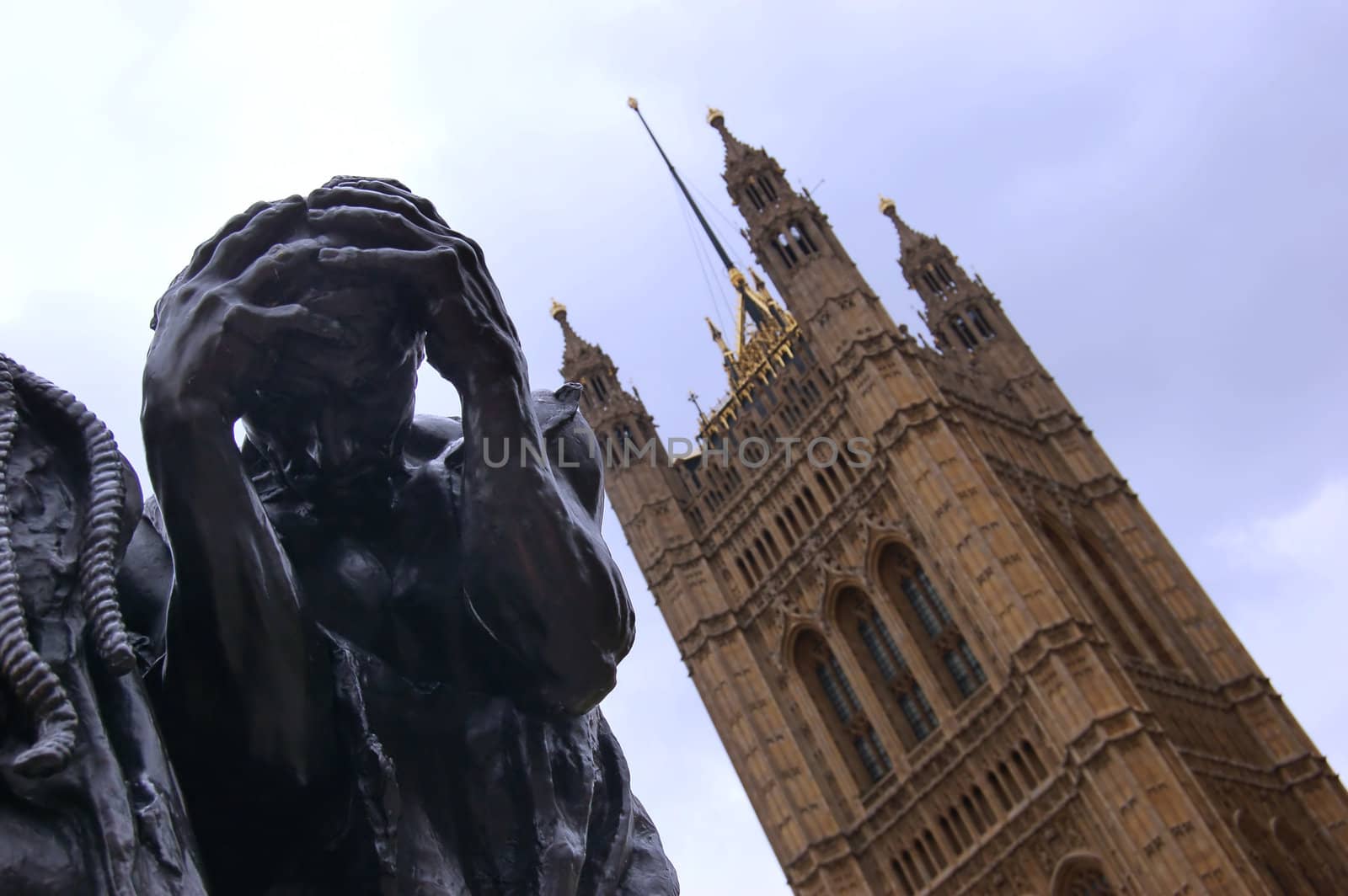 Dramatic statue over Westminster Houses of Parliament, London
