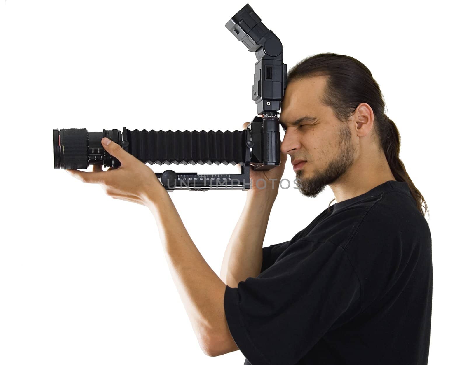 Young photographer with macro equipment isolated on white