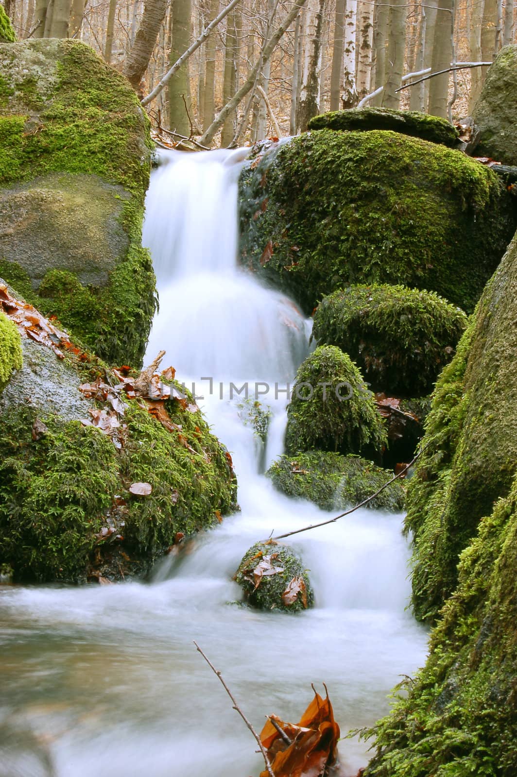 Mountain waterfall by johnnychaos