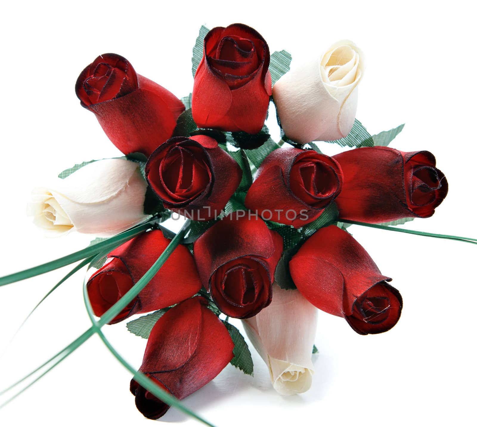 A bouquet of a dozen roses that are made of wood, isolated on a white background.