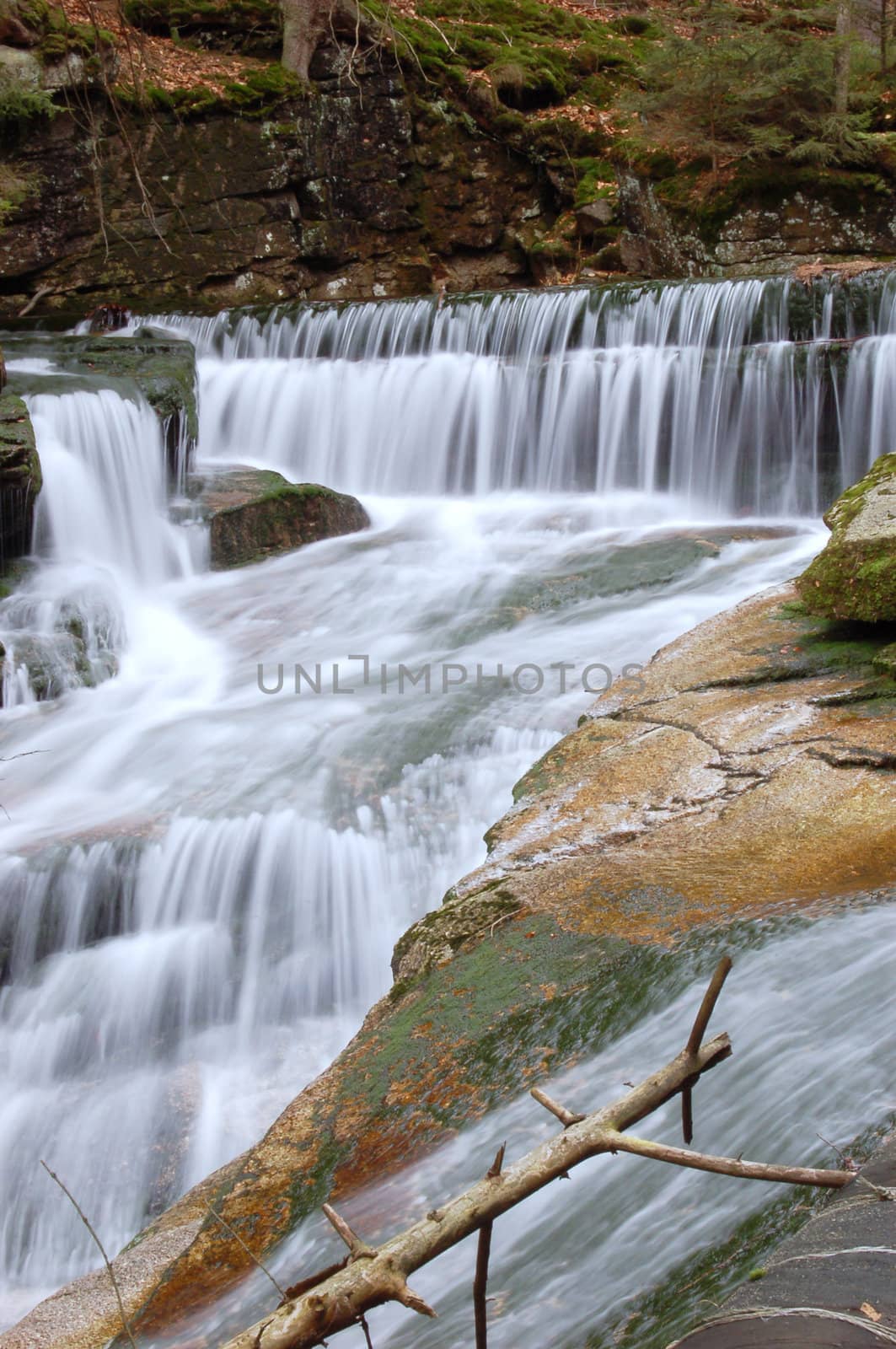 Mountain waterfall by johnnychaos