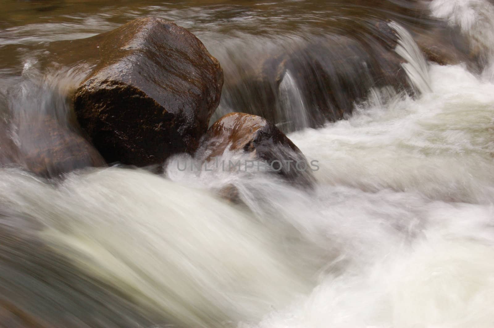 Mountain waterfall by johnnychaos