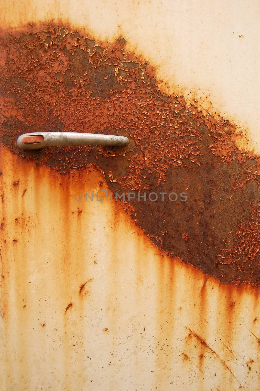 old, broken and rusty fridge