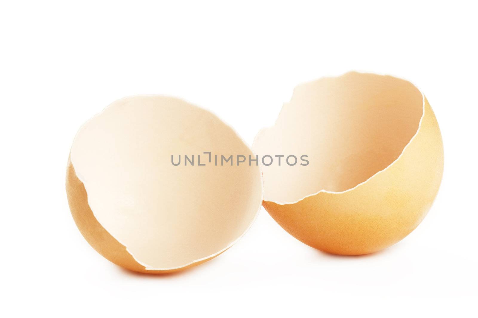 cracked eggshell isolated on white background