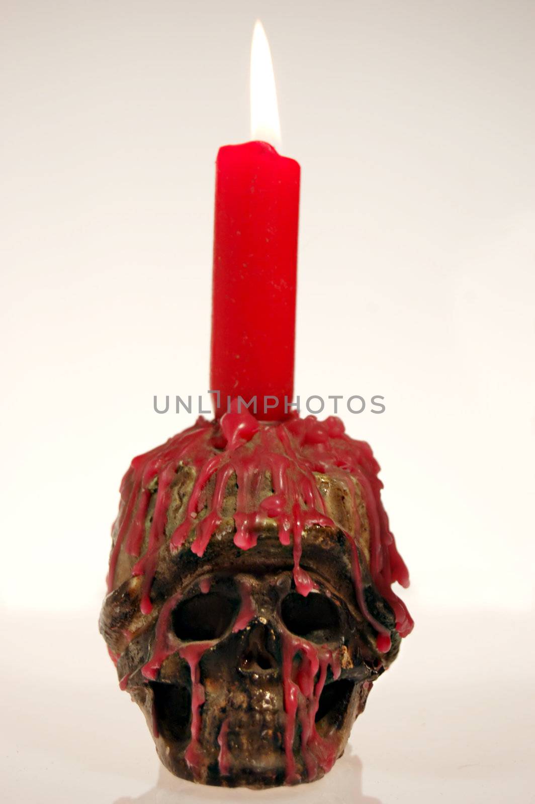 Spooky skull - candle holder. With candle.