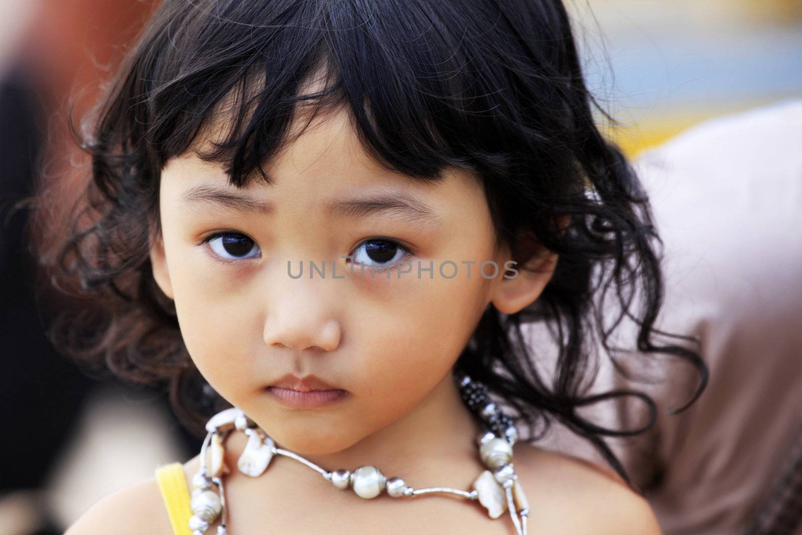 Portrait of the beautiful small Asian girl.  Indonesia. Java