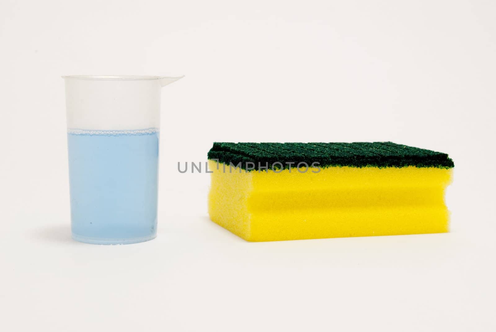 kitchen sponge and cleaning fluid
