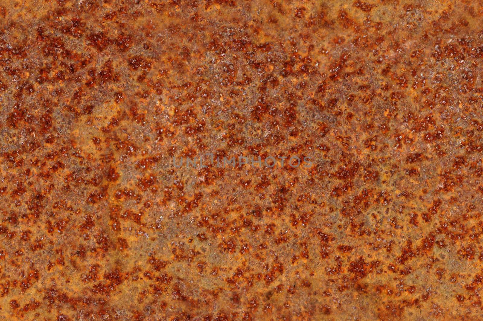 Rusted corroded metal surface seamlessly tileable, reddish orange in color.