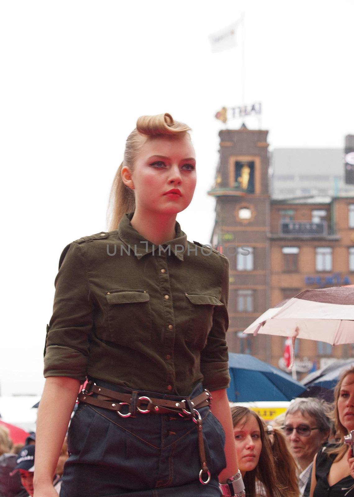 COPENHAGEN - AUGUST 14 : Participating model at the longest ever catwalk during the Copenhagen Fashion Week. 220 models joins the mile long catwalk on August 14, 2010 in Copenhagen, Denmark. 