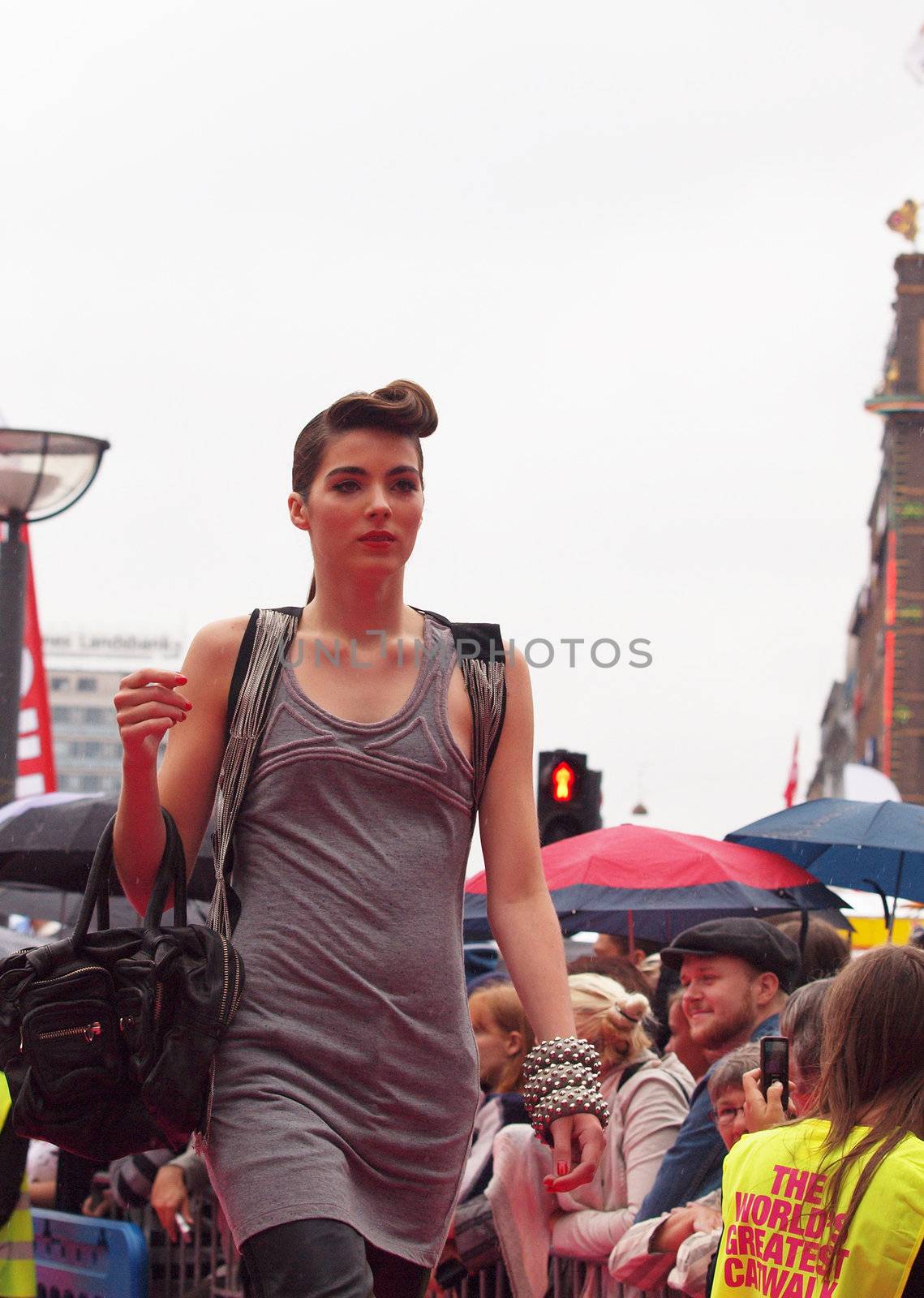 COPENHAGEN - AUGUST 14 : Participating model at the longest ever catwalk during the Copenhagen Fashion Week. 220 models joins the mile long catwalk on August 14, 2010 in Copenhagen, Denmark. 