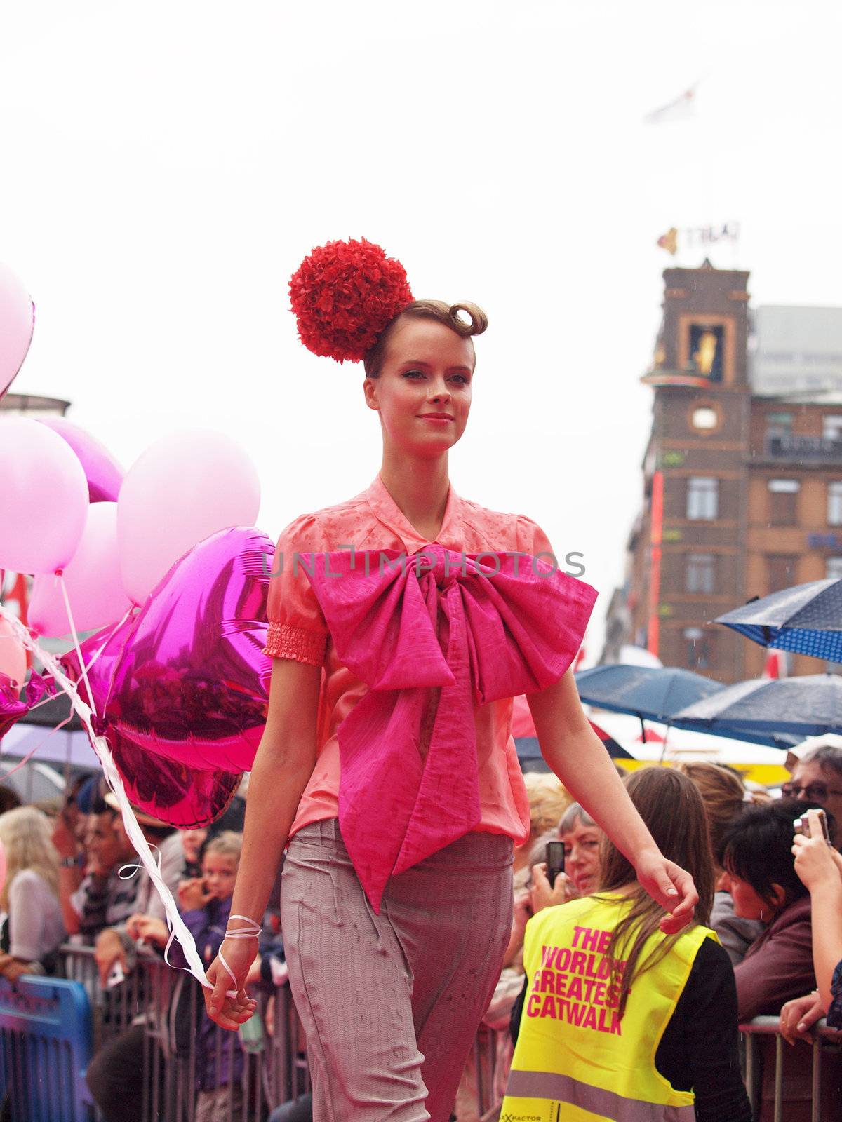 COPENHAGEN - AUGUST 14 : Participating model at the longest ever catwalk during the Copenhagen Fashion Week. 220 models joins the mile long catwalk on August 14, 2010 in Copenhagen, Denmark. 