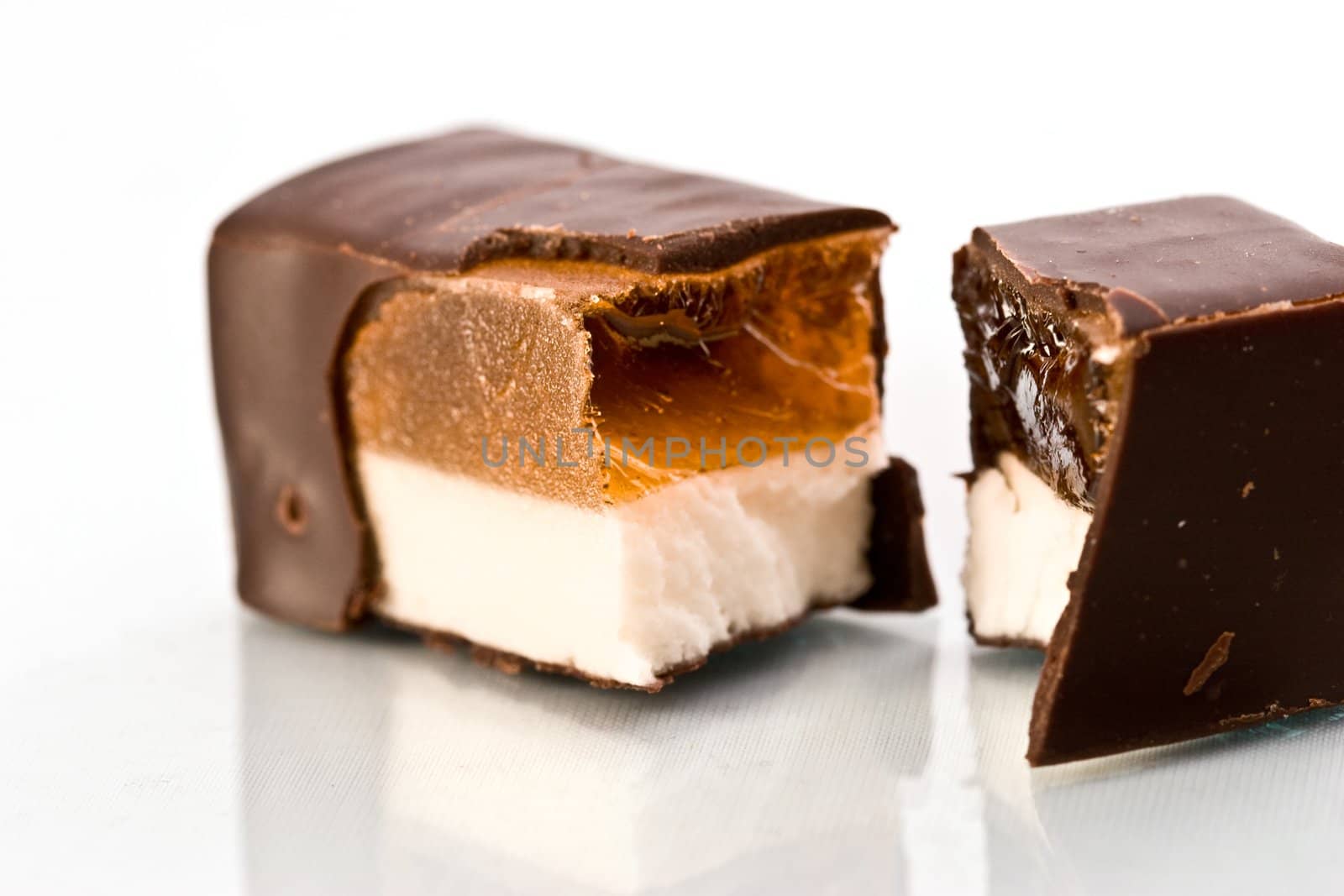 macro picture of chocolate candy with jelly and  cream