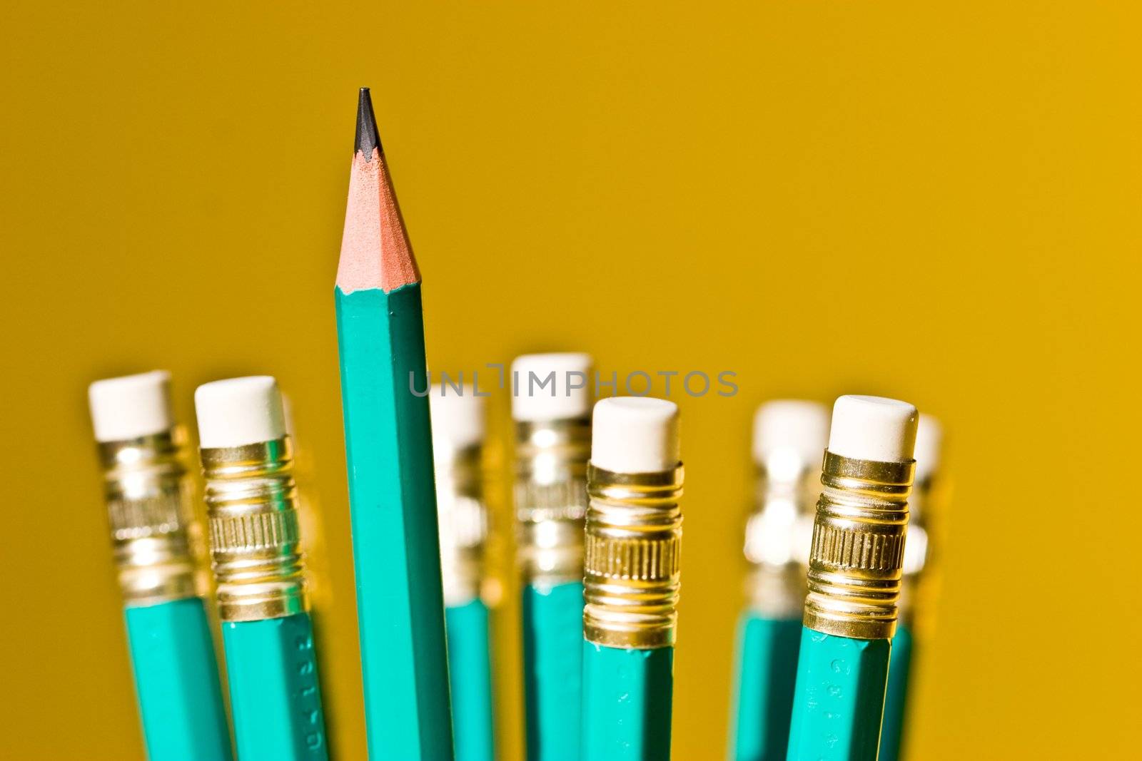 stationery series: pencils with eraser over yellow background