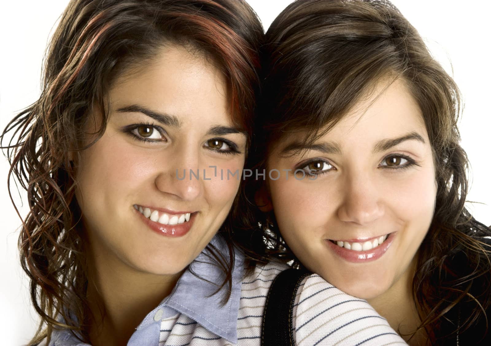 Portrait of two young and beautiful sisters - This models are twins