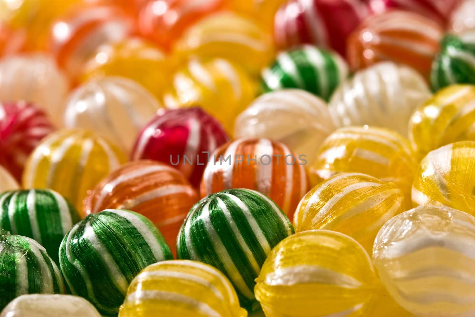 food serias: sweet background of striped sugar candy