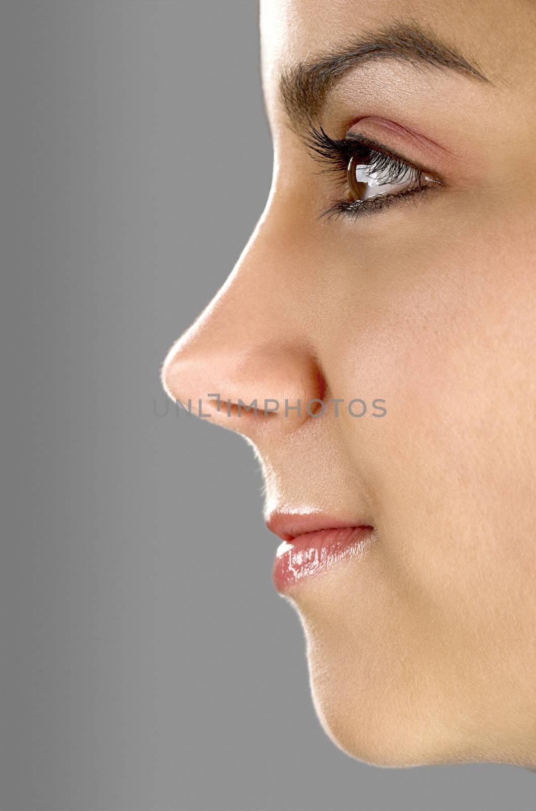 Profile portrait of a young and beautiful woman