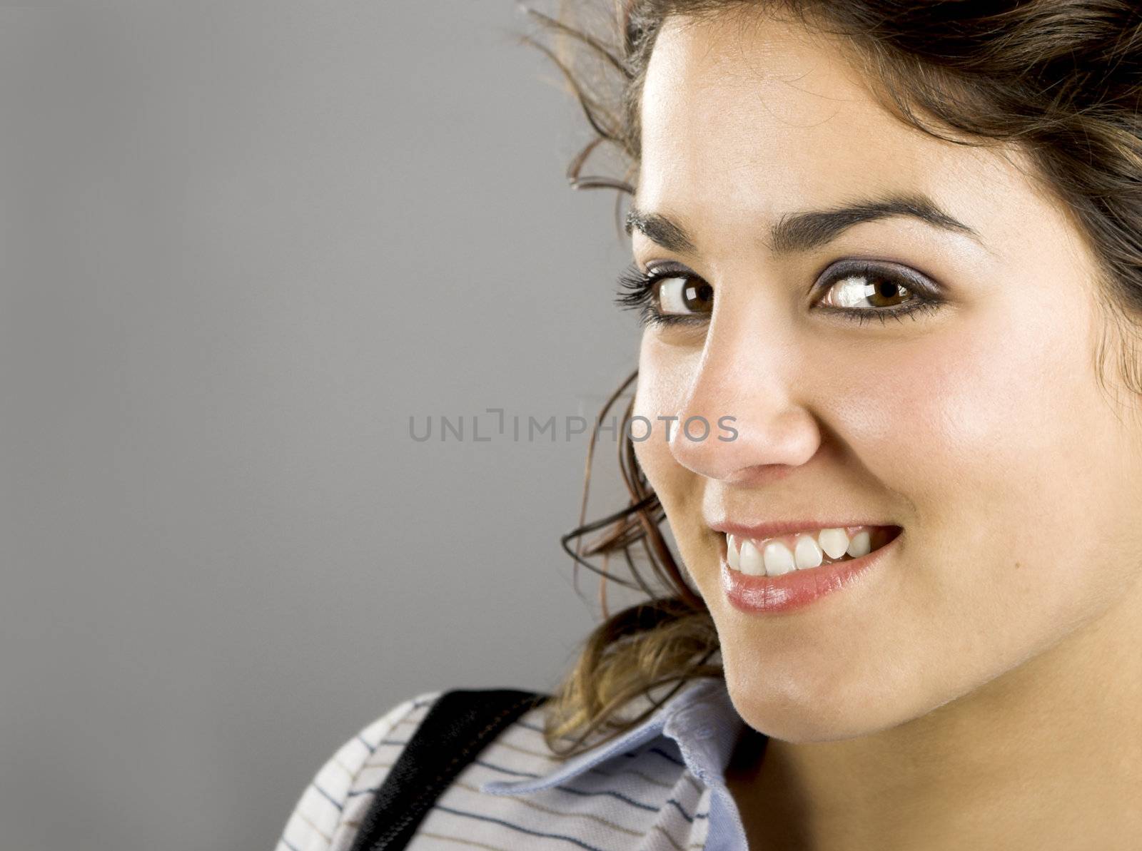 A close-up portrait  of a beautiful young and attractive woman