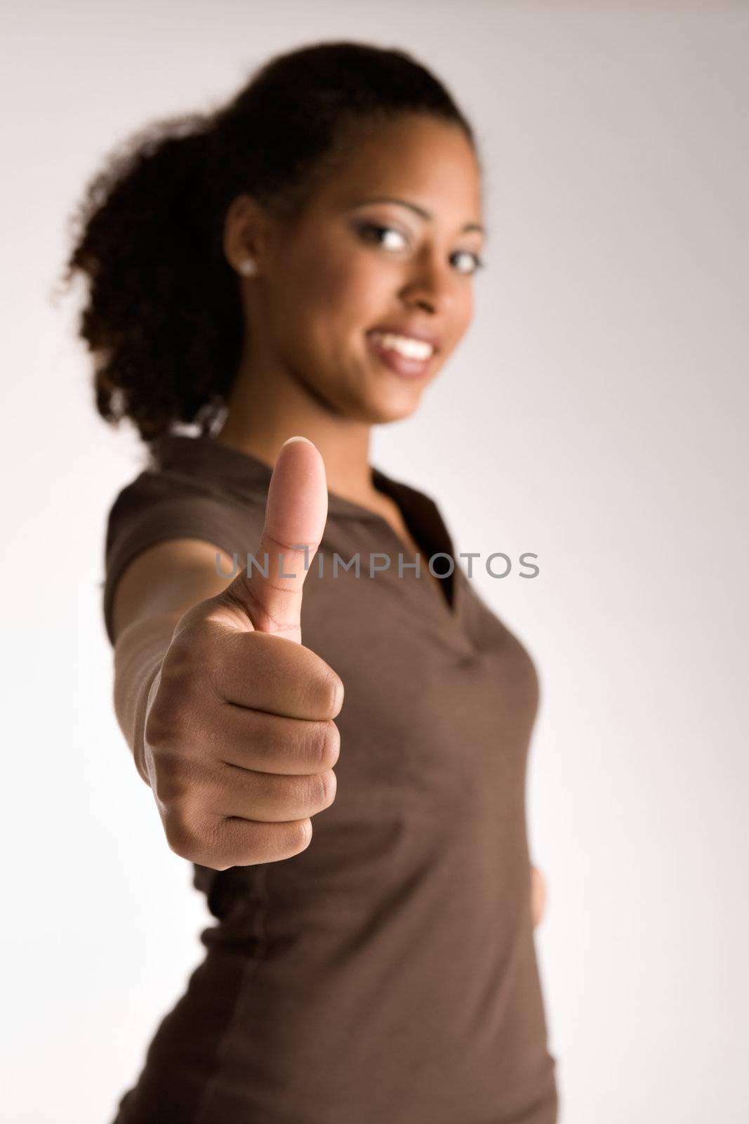 Woman is holding her thumb up by DNFStyle