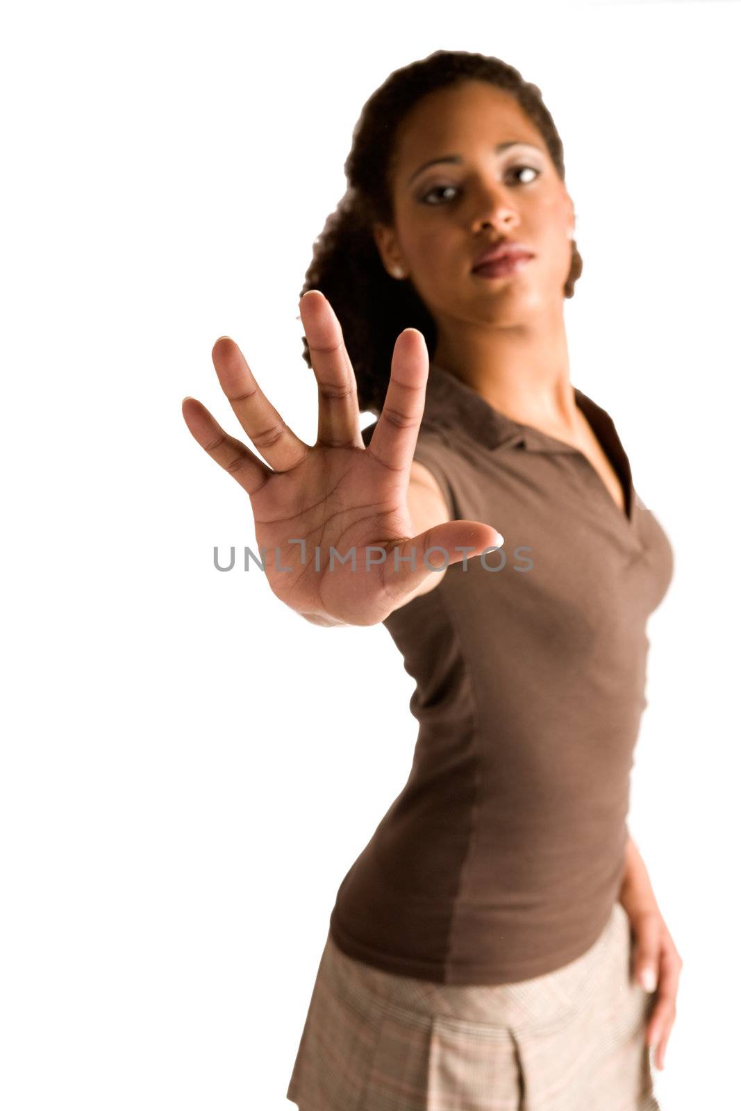 Beautiful african young woman gives a stop sign