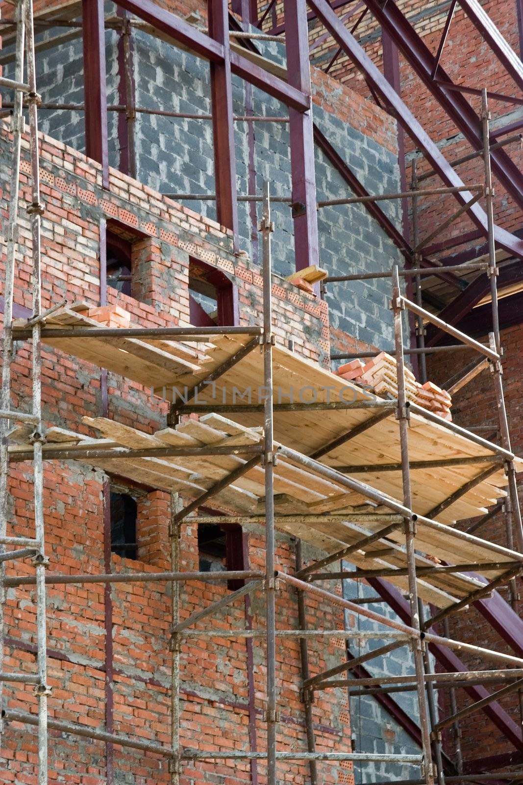 city series: building under construction wiyh scaffolding