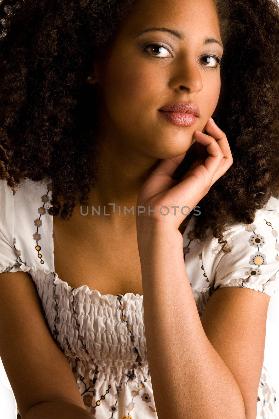 African woman with a hand on her chin by DNFStyle