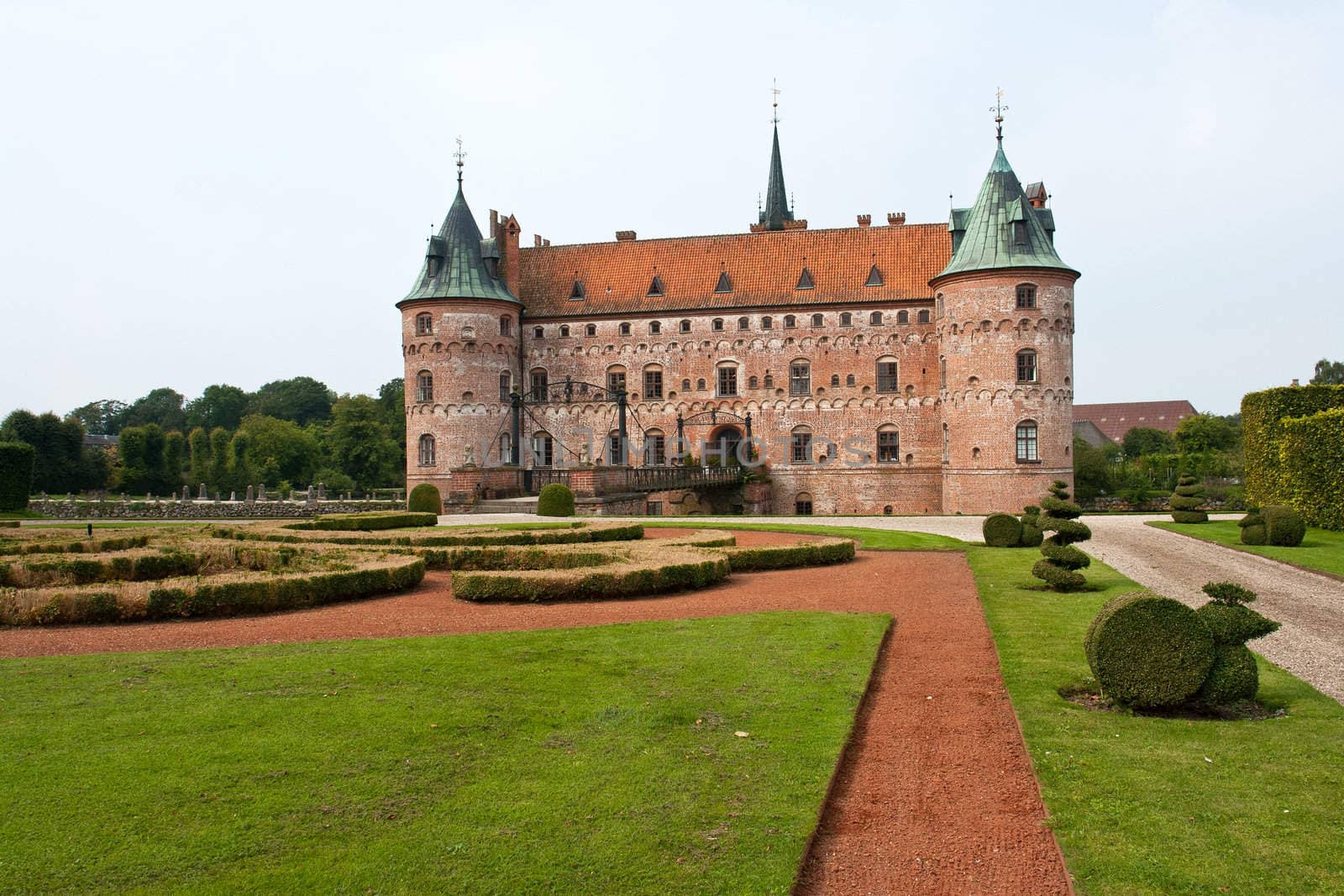 Egeskov castle slot landmark fairy tale castle in Funen Denmark view from the back garden 