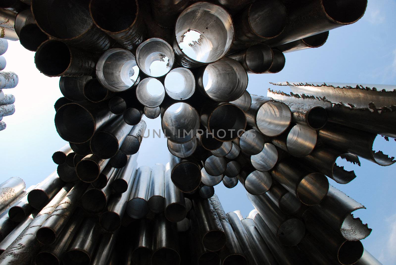 An original monument in Helsinki, finland, named Sibellius monument. It's composed of many iron pipes.
This photo was taken from the floor and we can see the sky throughout thes pipes.