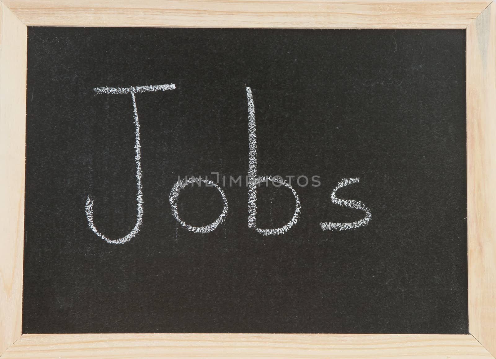 Black chalk board with wooden framed surround with the word Jobs.