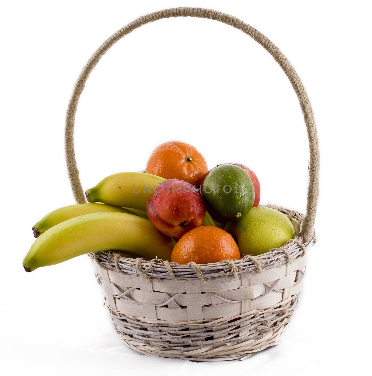 Fruits in retro basket on the white background - isolated
