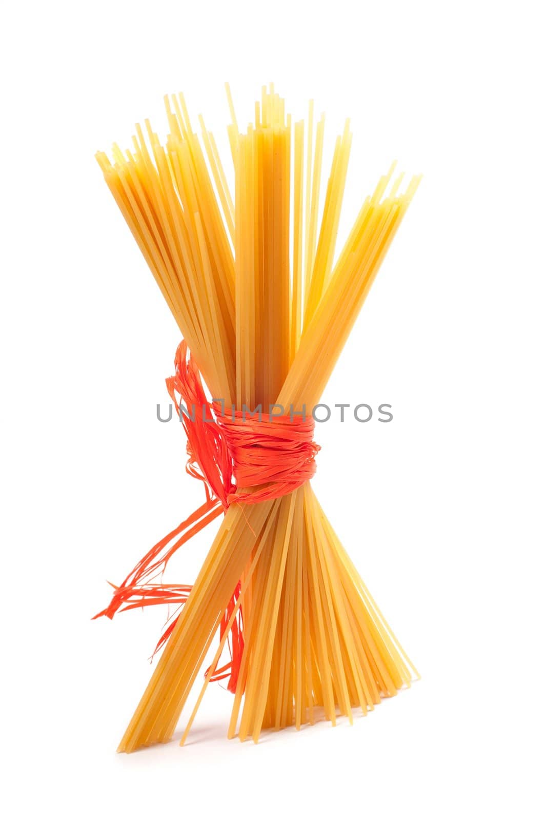 Shot of uncooked spaghetti isolated on white