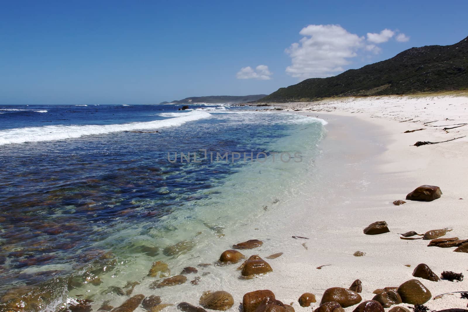 The cold, clear waters of the Atlantic Ocean at Maclear Beach, in the Cape of Good Hope area of the Cape Peninsula, South Africa.