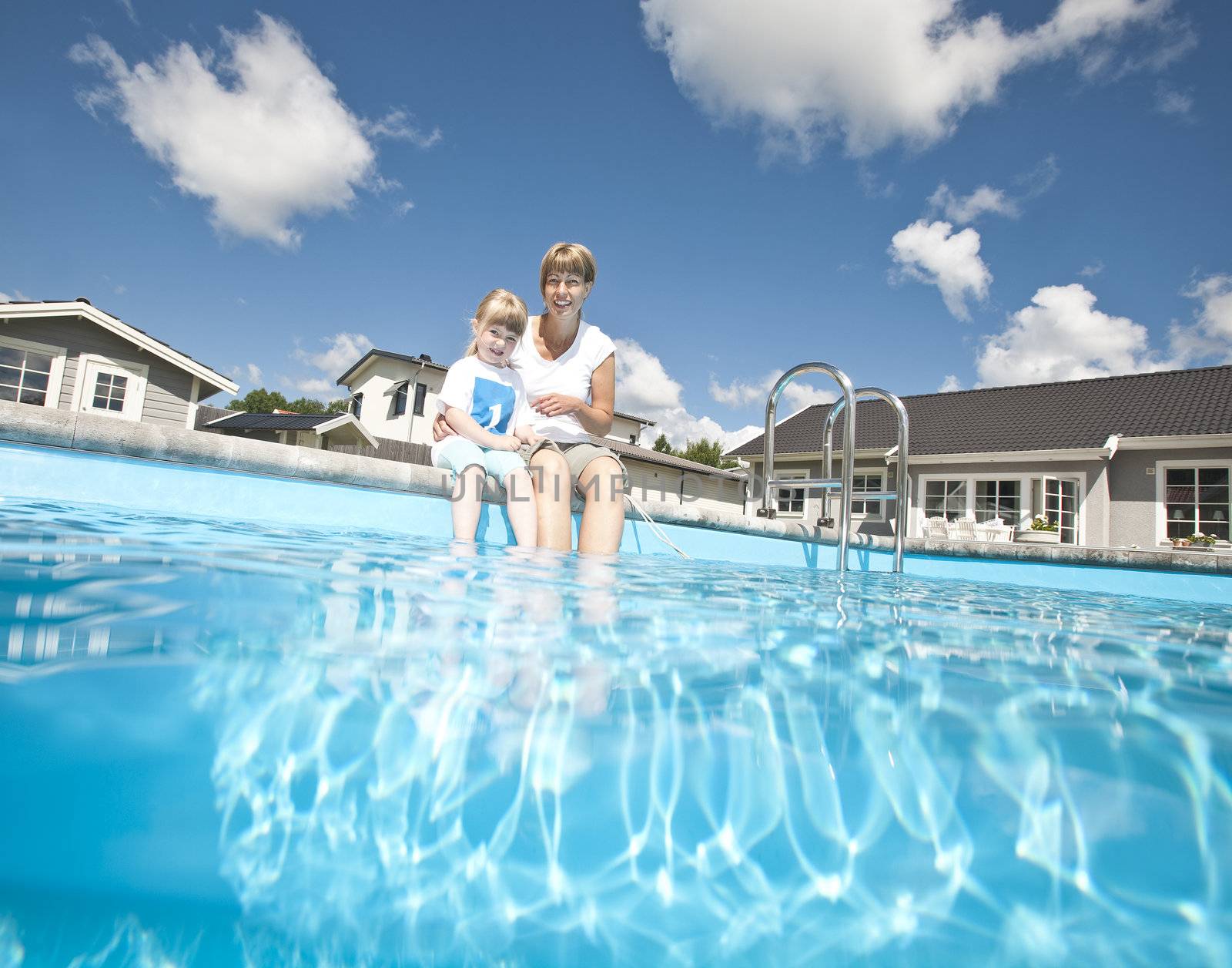 Mother and daughter at the Swimming pool area