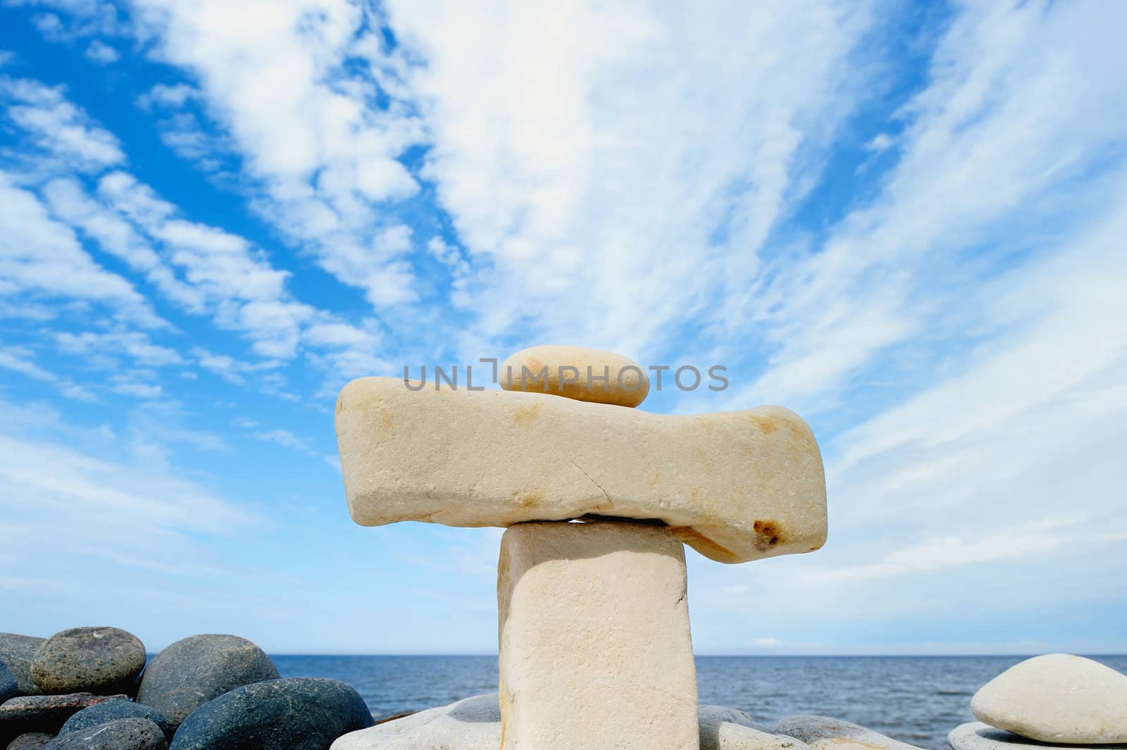 Balancing of pebbles on the sea coast