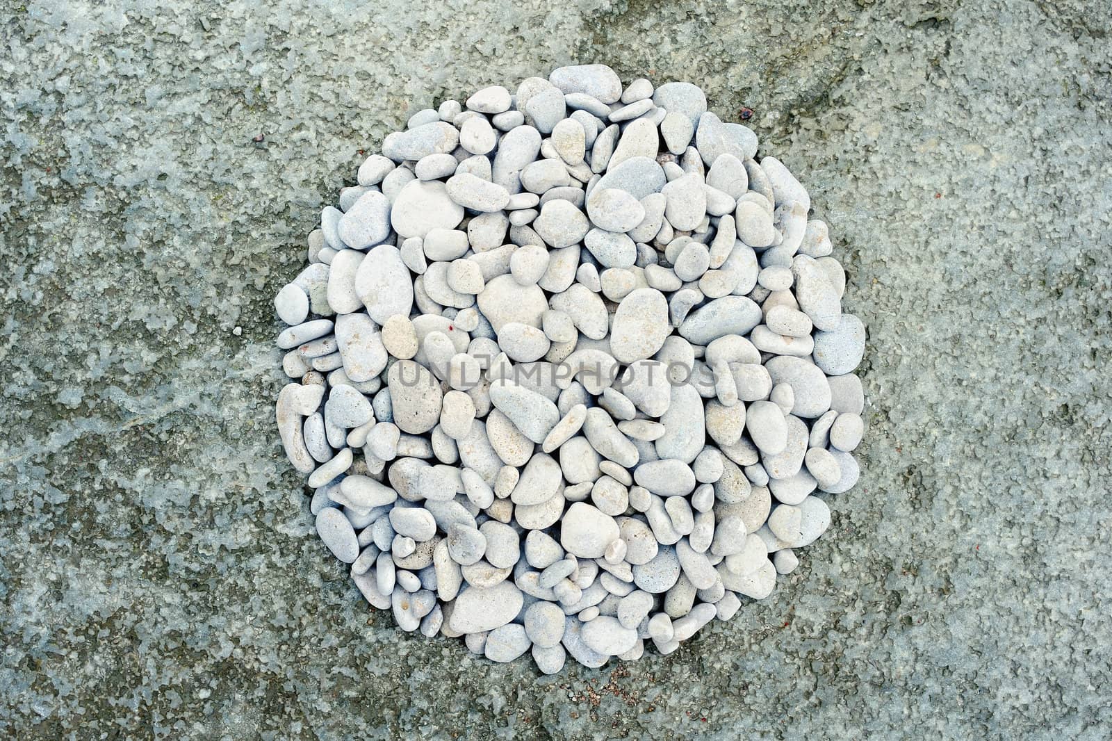 Abstract background. Coastal pebbles in round shape
