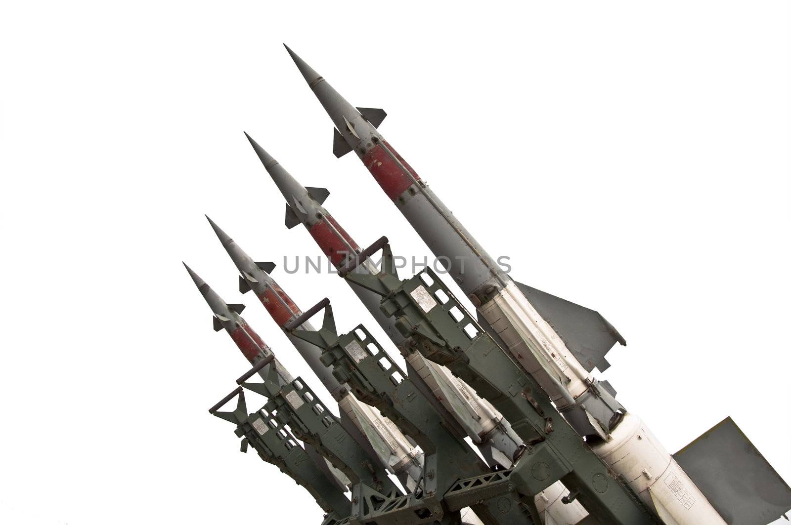 Several combat missiles aimed at the sky. Isolated on a white background. Missile weapons.