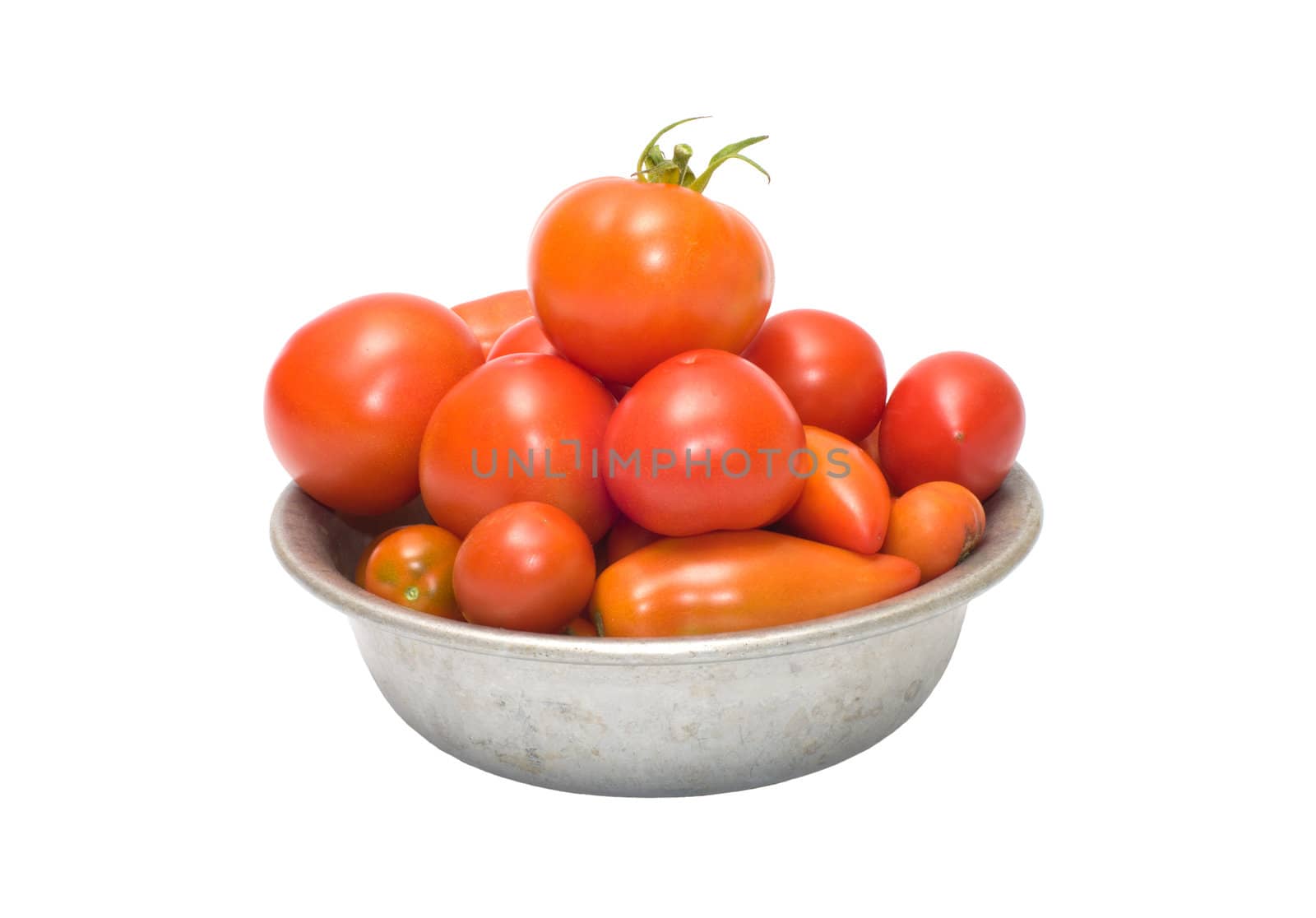 Tomatoes in an aluminum bowl, isolated on a white background.