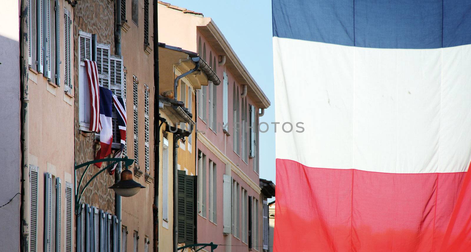 flags in the streets of france blue white and red