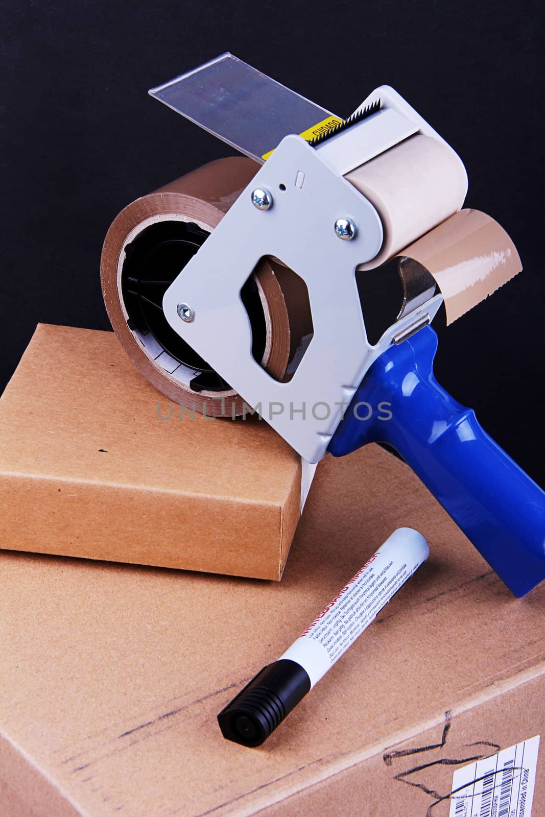 tape dispenser and pen with parcel boxes