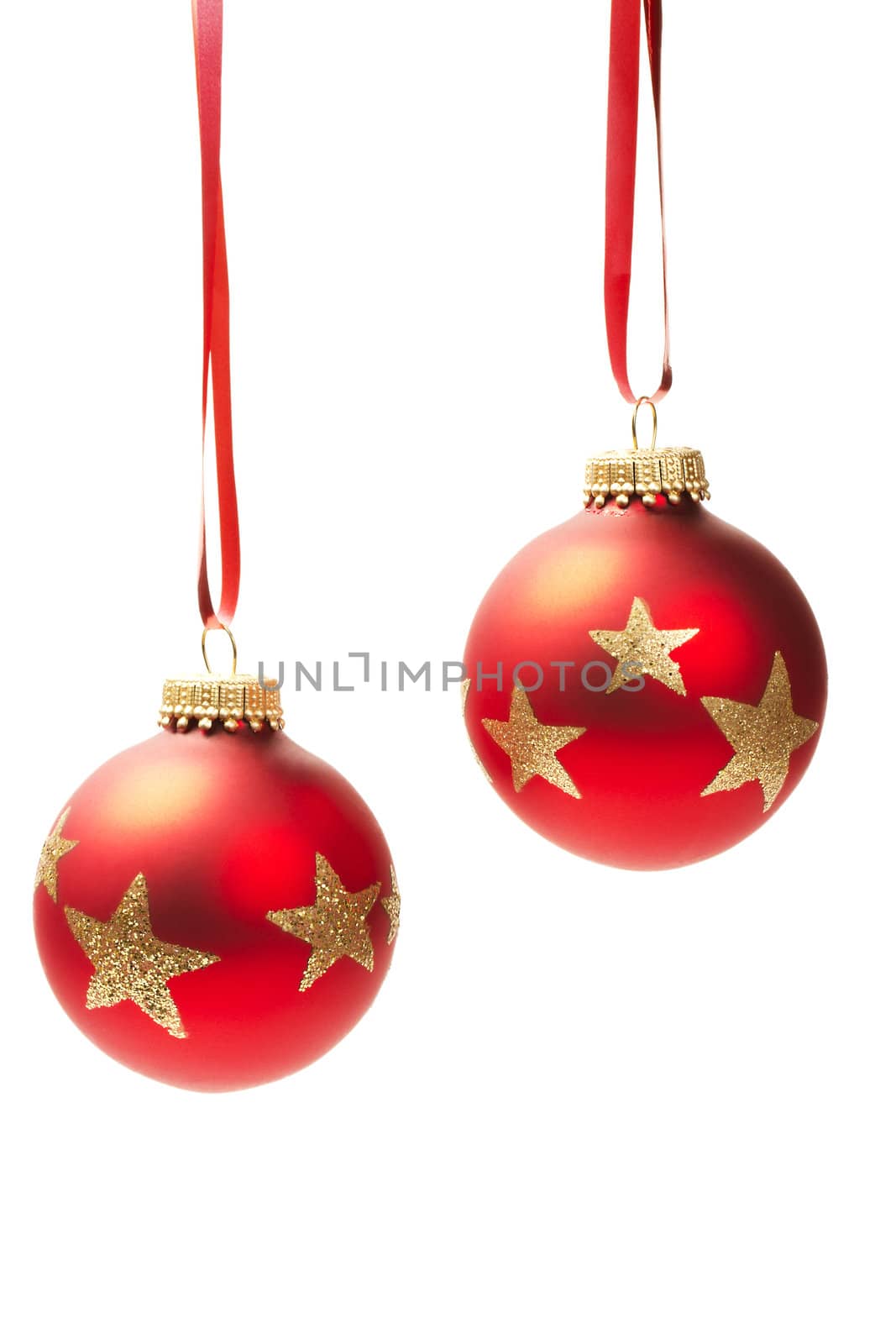 two hanging red dull christmas balls isolated on white background