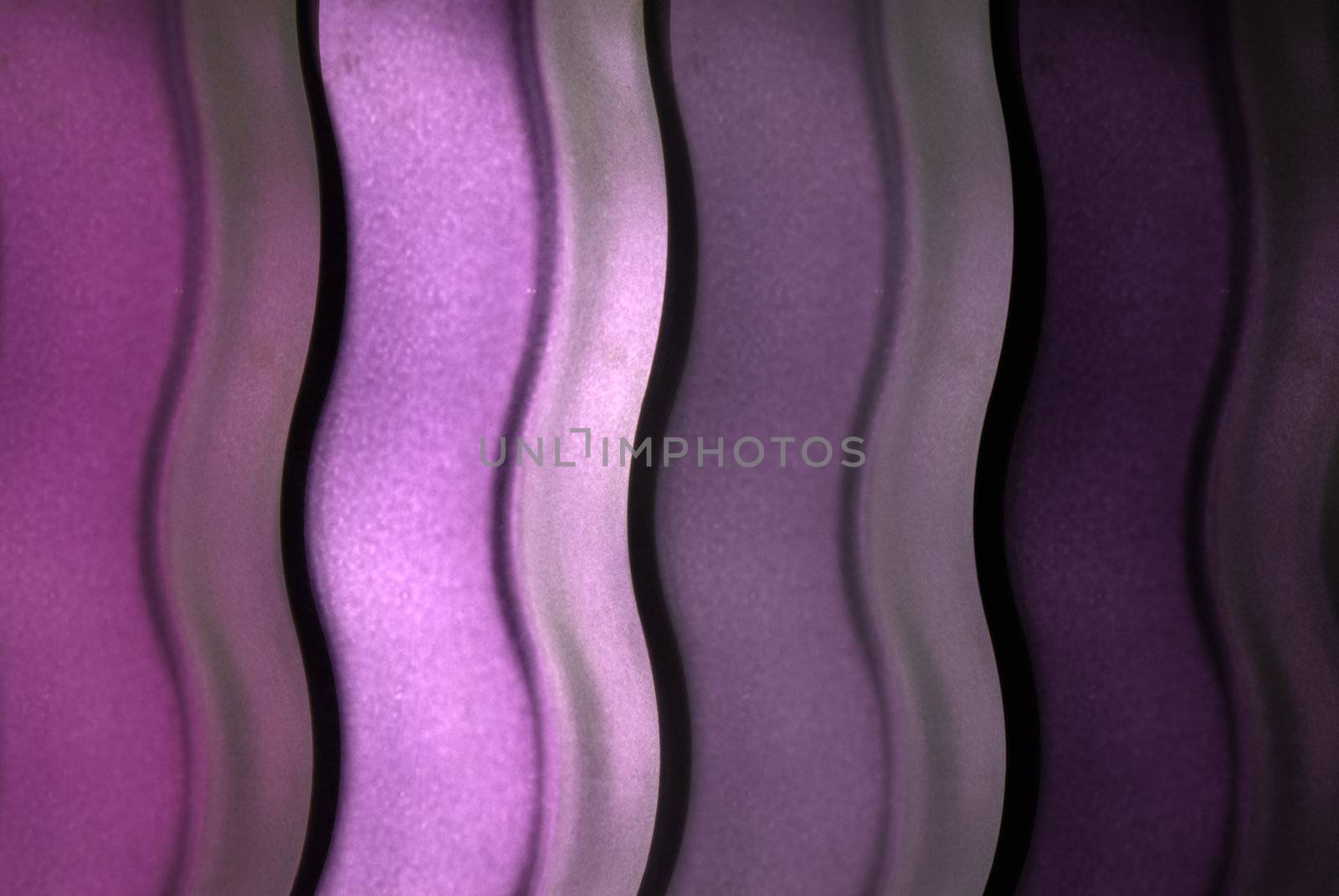 Abstract color background of backlit color glass.