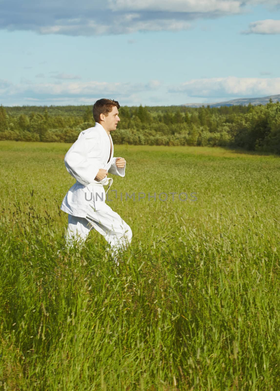 Young man is engaged in run by pzaxe