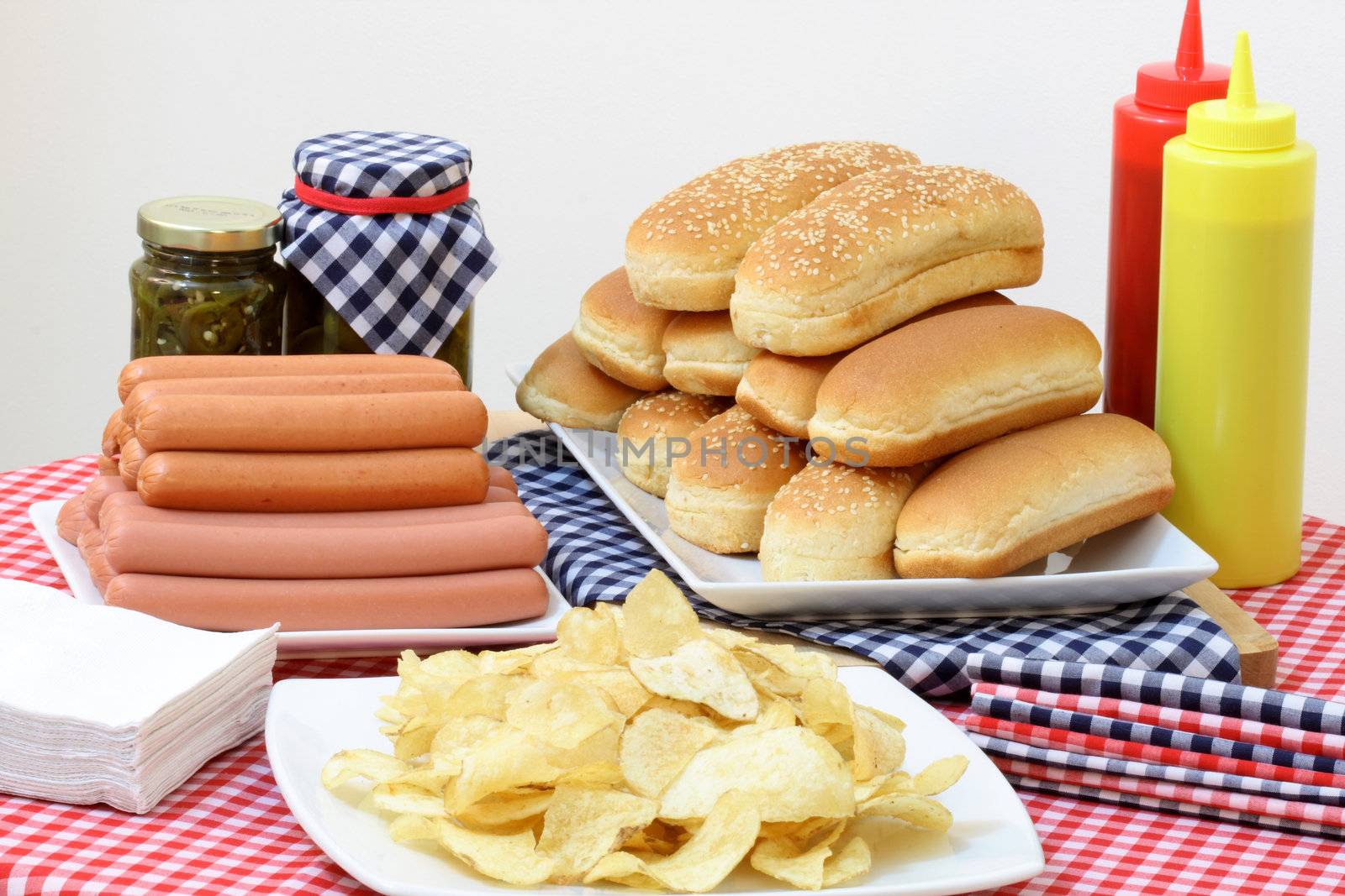 hot dog ingredients on a nice table setting rich in colors and flavors 