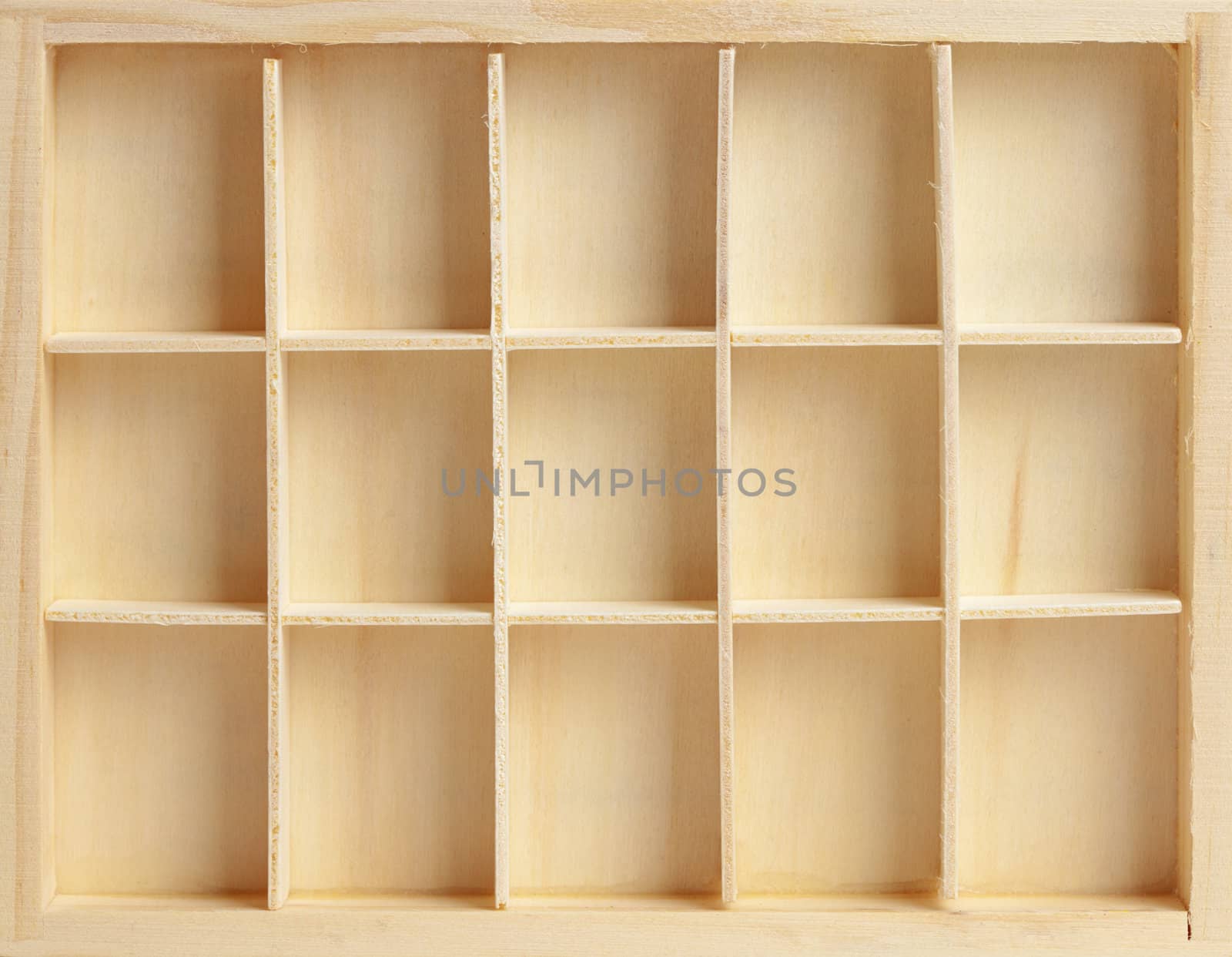 Wooden box on fifteen cells similar to a rack