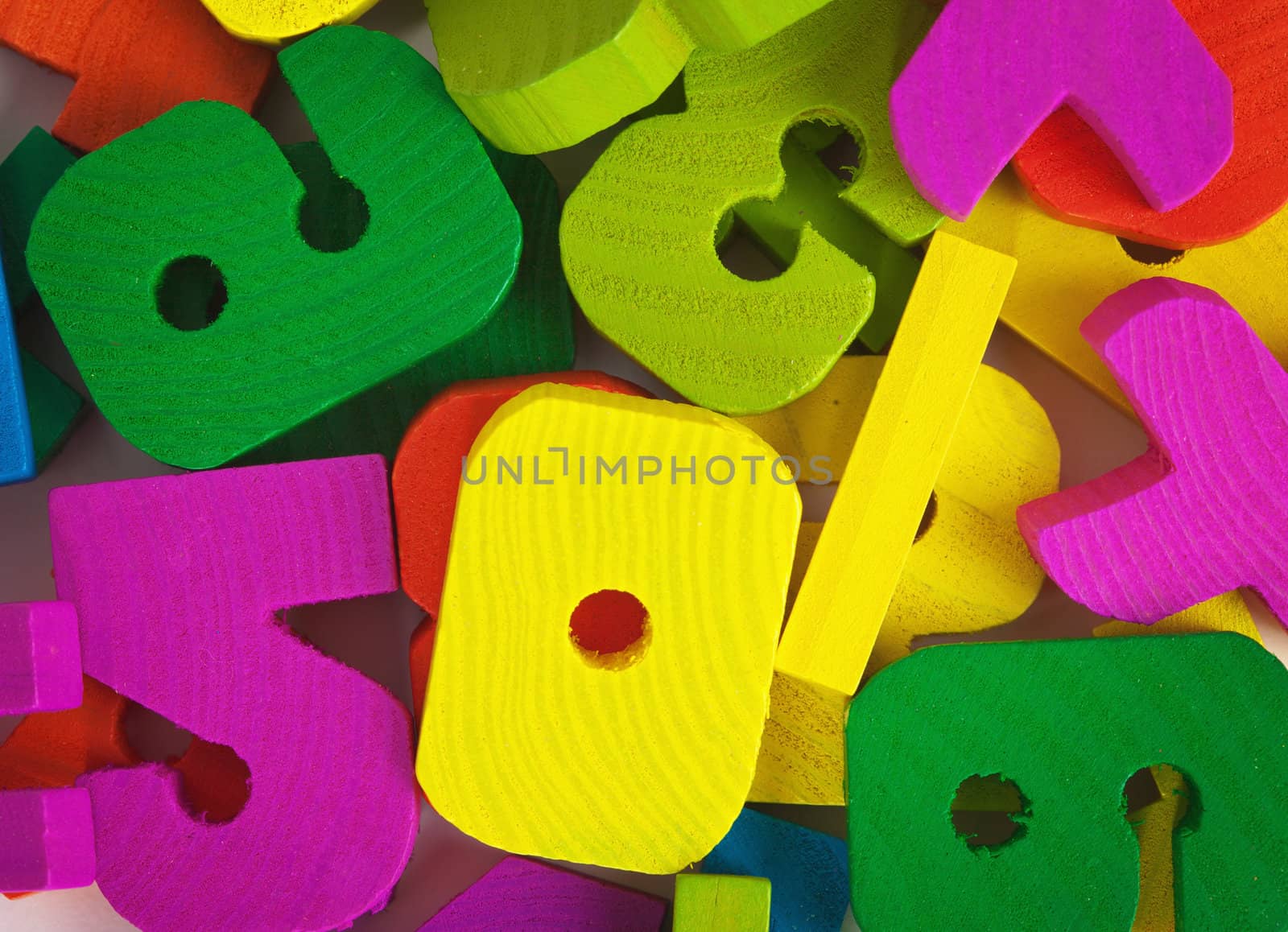 Heap of the wooden old-fashioned painted toys