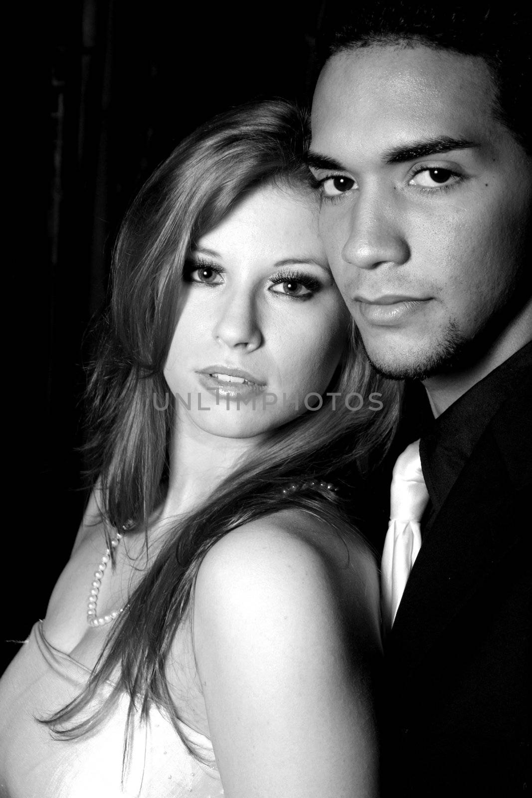 A woman and hispanic man by mahnken