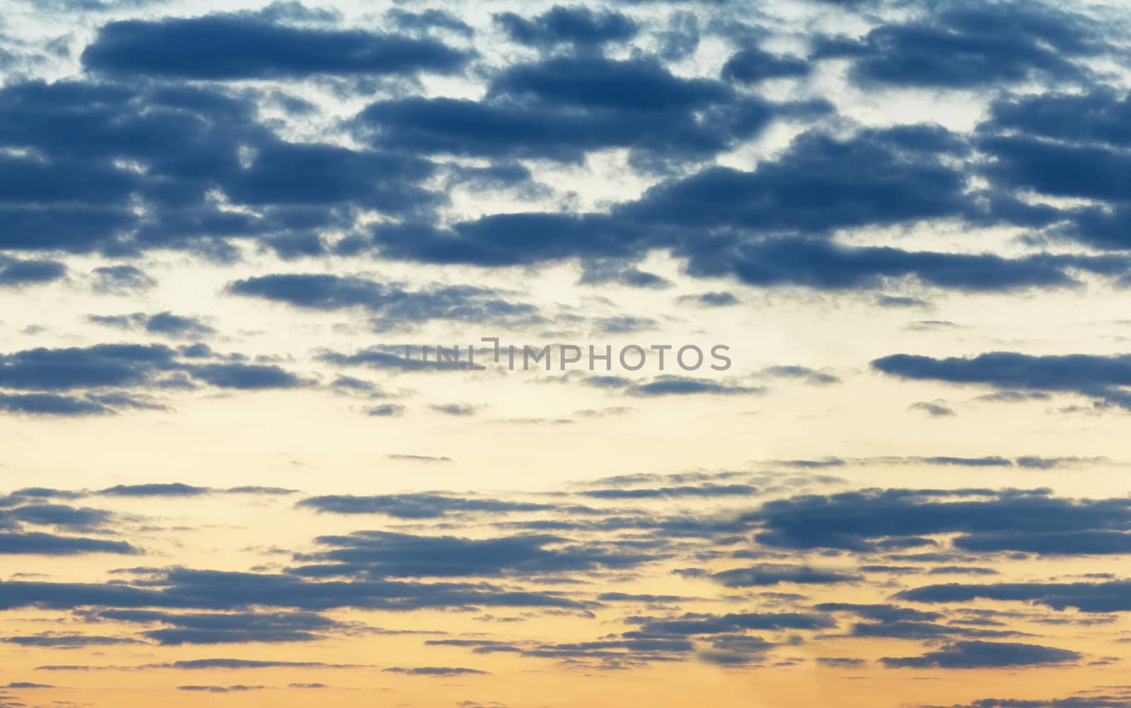 Horizontal seamless panorama of the evening sky with clouds
