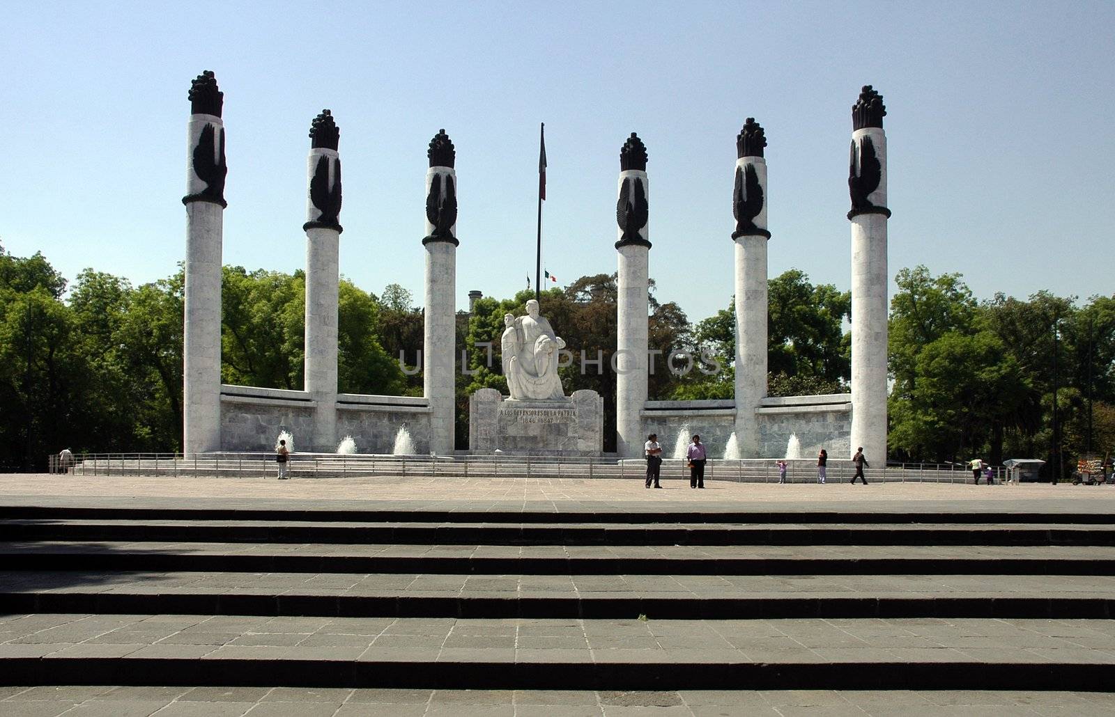 Monument scultpure and columns around square in Mexico city