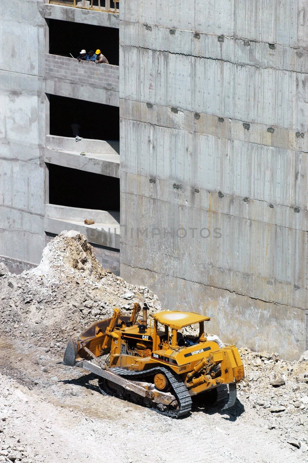 Yellow buldozer on building ground in Mexico city